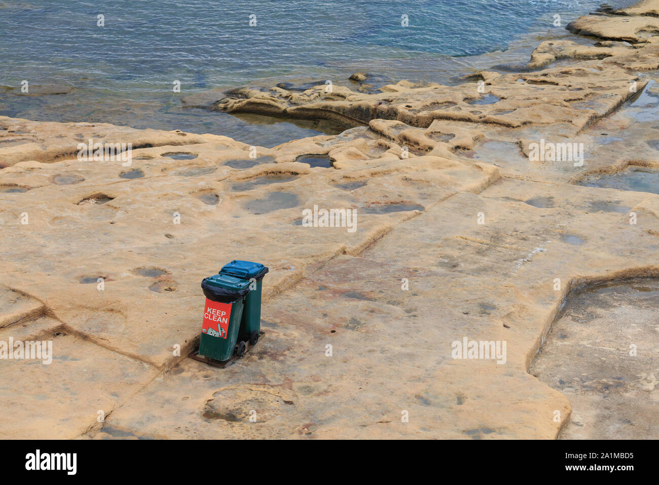 Two trash bins in public Malta beach city Sliema Stock Photo