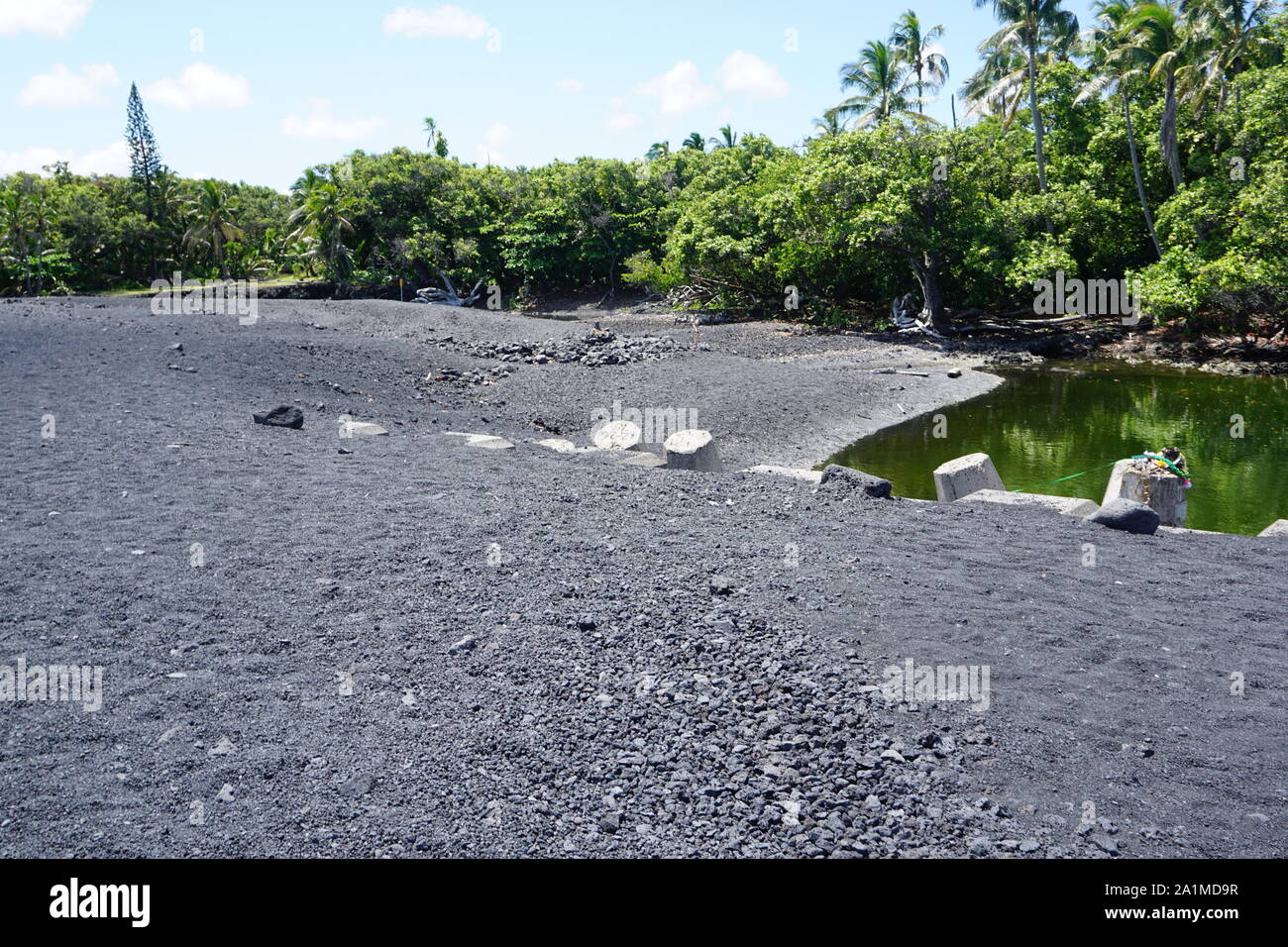 Pohoiki Beach, Hawaii's newest black sand beach, was formed by the 2018 eruptions of the Kilauea volcano. Stock Photo