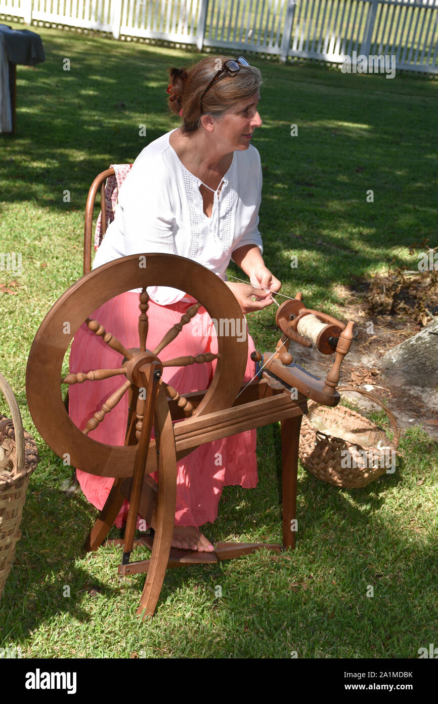 A demonstration of how a spinning wheel was used in colonial times