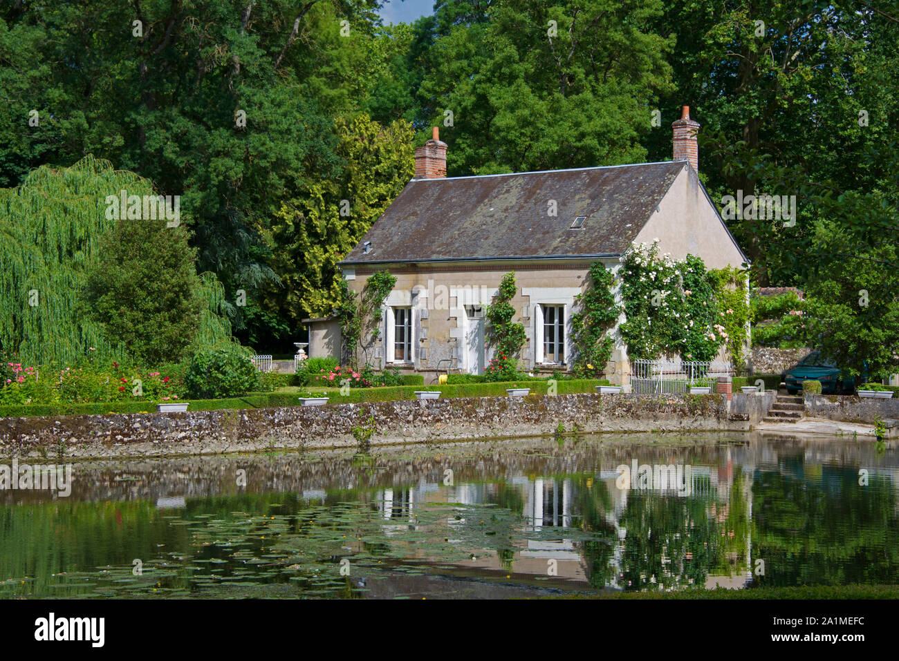 Pretty cottage beside Indre River Montbazon Indre et Loire France Stock Photo
