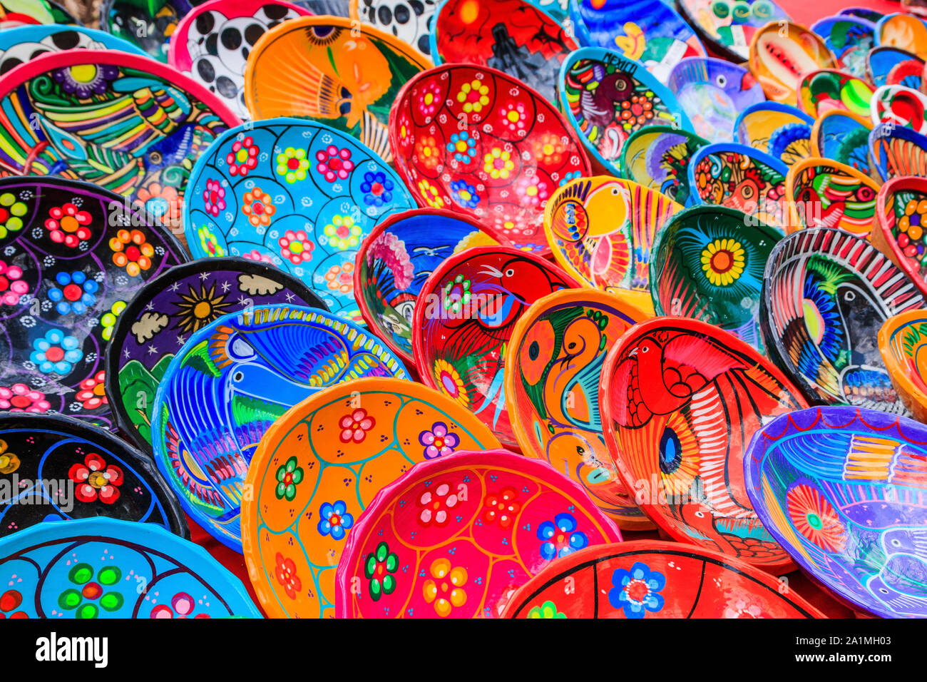 Chichen Itza, Mexico. Colorful traditional mexican ceramics souvenirs on the street market at Chichen Itza. Stock Photo