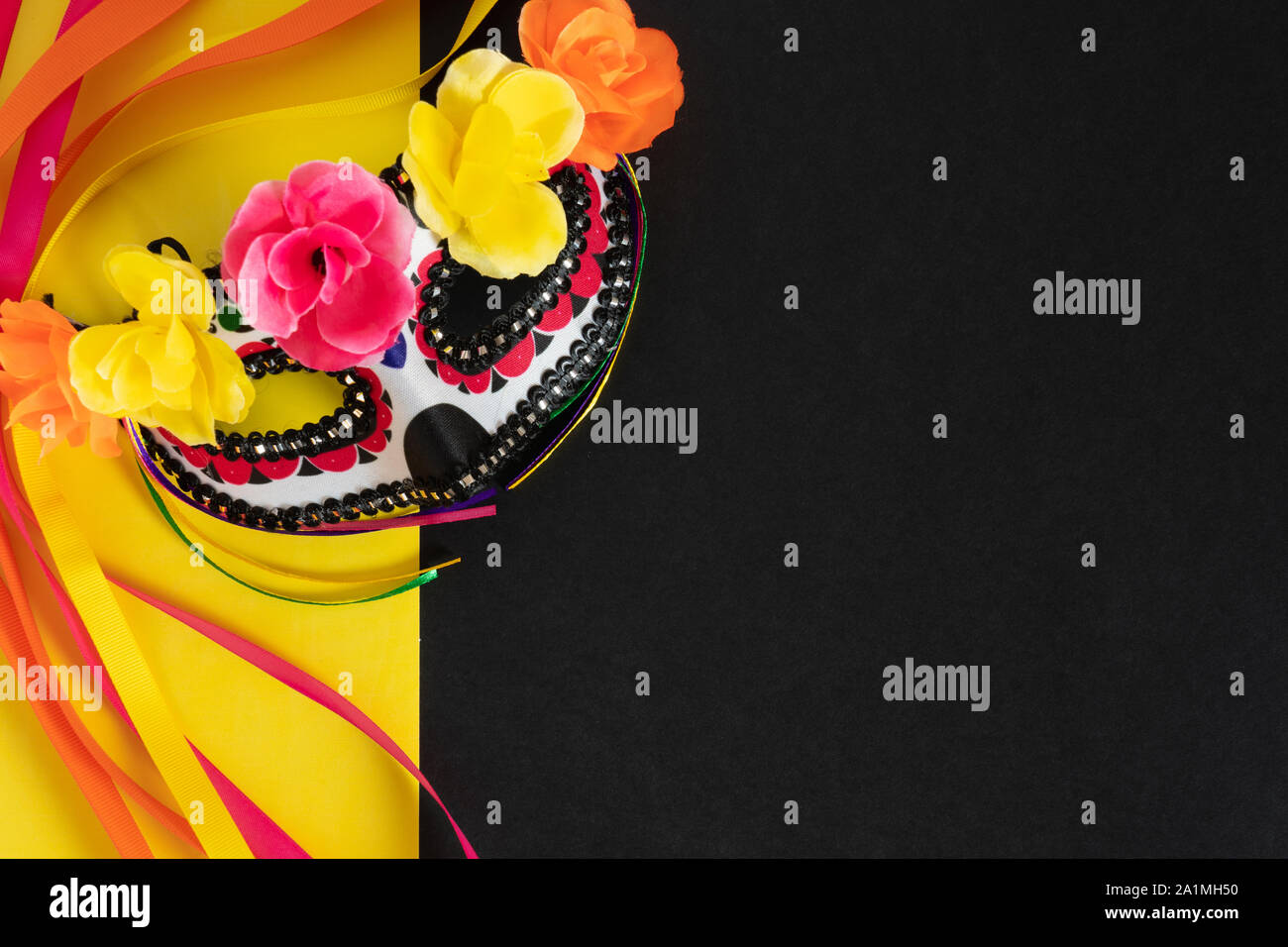 Download Day Of The Dead Or Dia De Los Muertos Background Of A Mask With Black Red And White Skeletal Design And Bright Pink Orange And Yellow Flowers And R Stock Photo PSD Mockup Templates