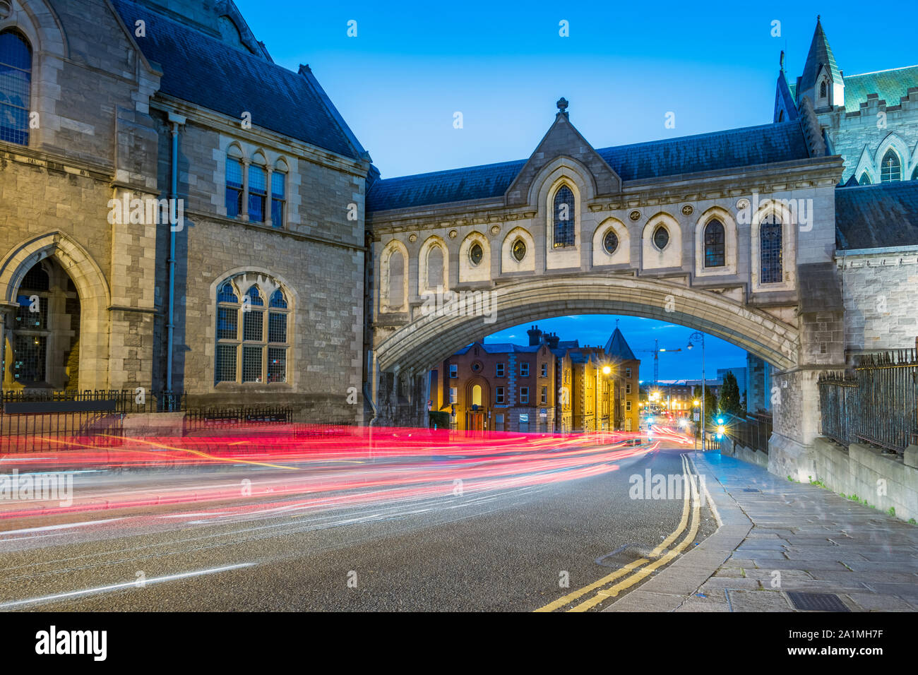 The enclosed stone arch bridge that connects Christ Church Cathedral to the Synod Hall across Winetavern Street in Dublin Ireland Stock Photo