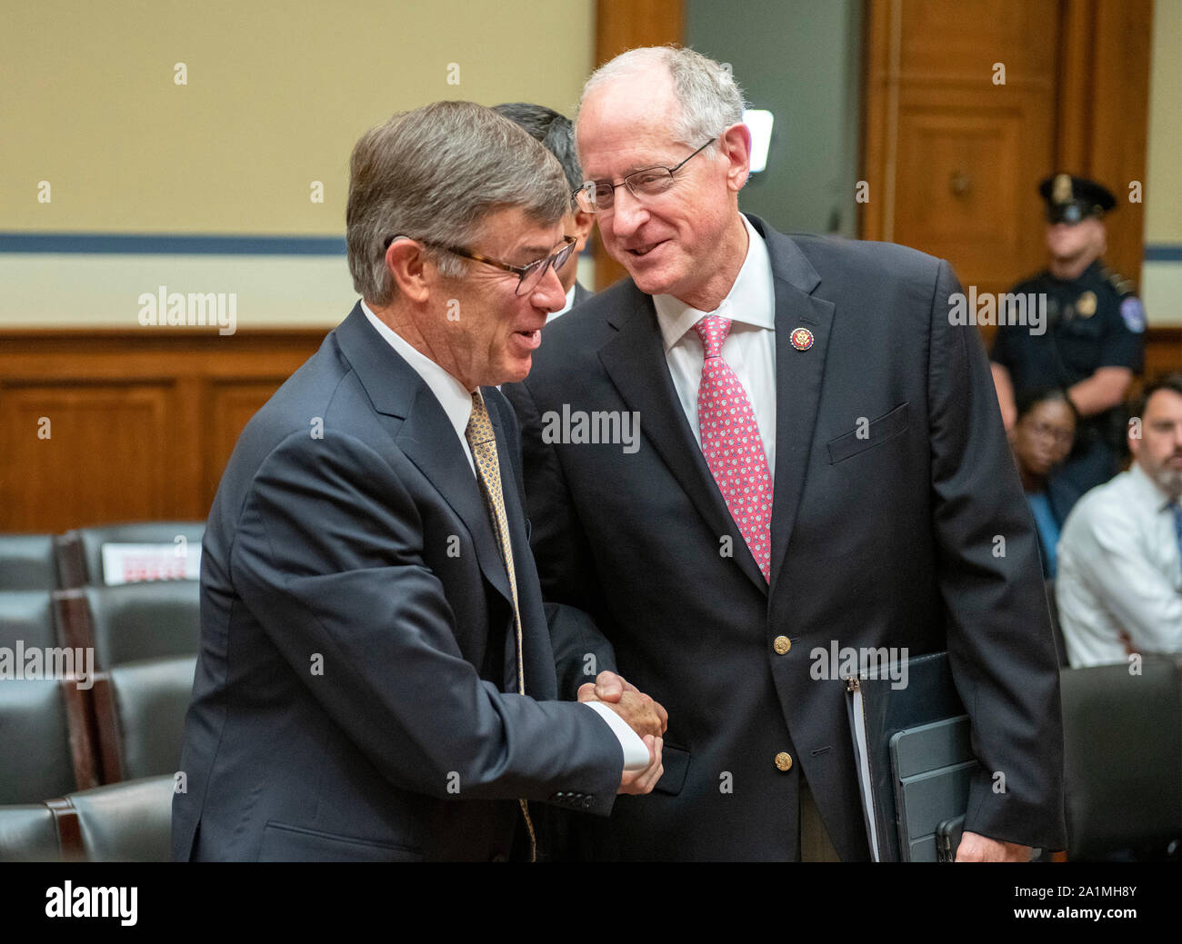 Vice Admiral Joseph Maguire (US Navy retired), acting Director of National Intelligence, left, shakes hands with United States Representative Mike Conaway (Republican of Texas), right, following his testimony before the US House Permanent Select Committee on Intelligence on the Whistleblower Complaint on Capitol Hill in Washington, DC on Thursday, September 26, 2019.Credit: Ron Sachs/CNP (RESTRICTION: NO New York or New Jersey Newspapers or newspapers within a 75 mile radius of New York City) | usage worldwide Stock Photo