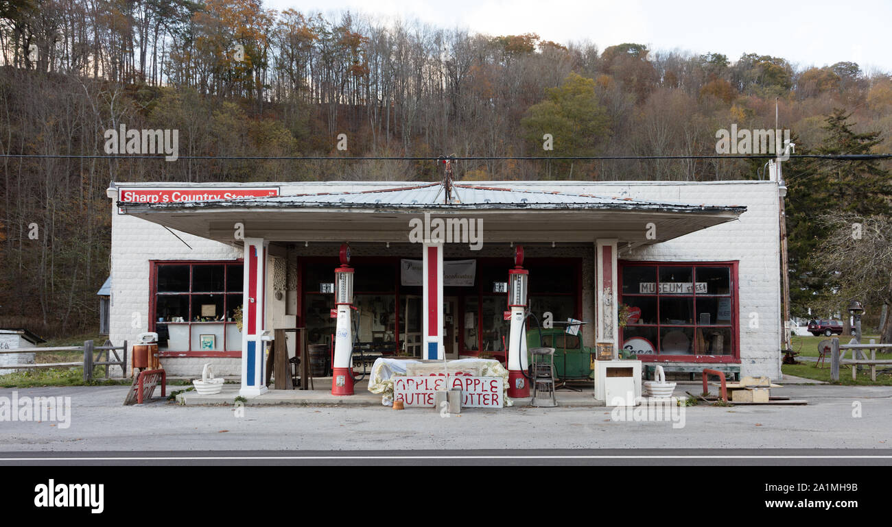 Old gas pumps and assorted supplies at Sharp's Country Store in Slaty Fork, an unincorporarted town in Pocahontas County, West Virginia Stock Photo