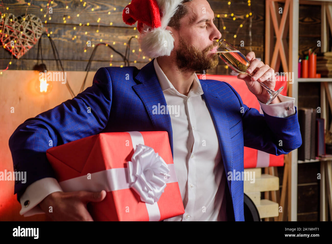Secret santa office tradition. Man formal suit hold gift box. Christmas gift  from colleague. Tradition giving gifts. Celebrate christmas corporate  party. Businessman excited face hold gift box Stock Photo - Alamy