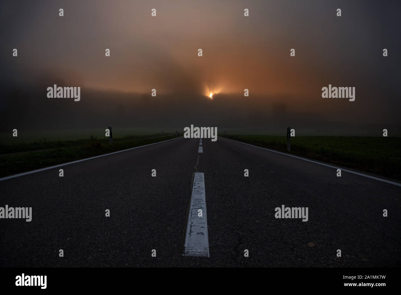 Winding country road at sunrise hi-res stock photography and images - Alamy