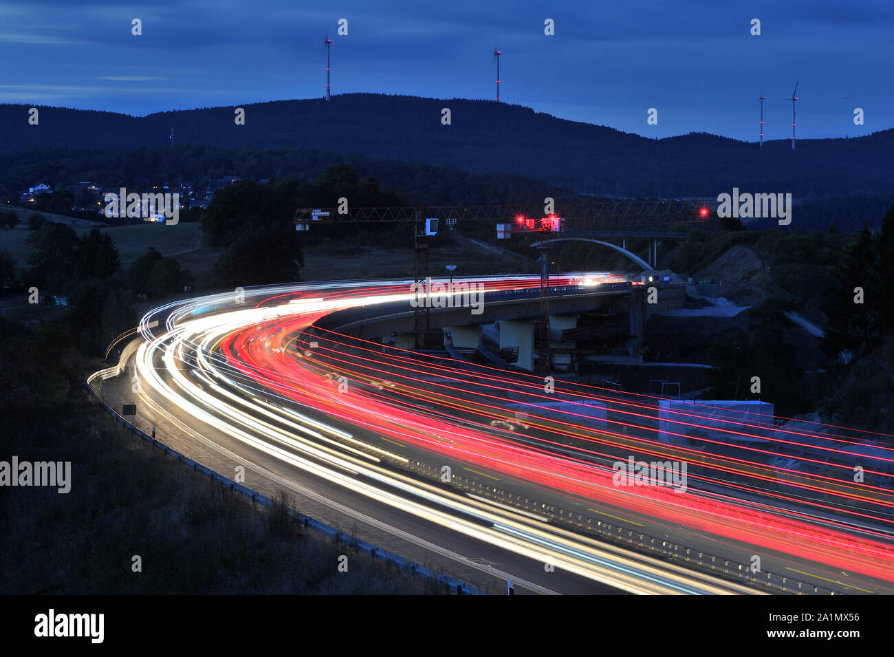 Traffic on a highway bridge at nigth (A45, Dillenburg, Germany) Stock Photo