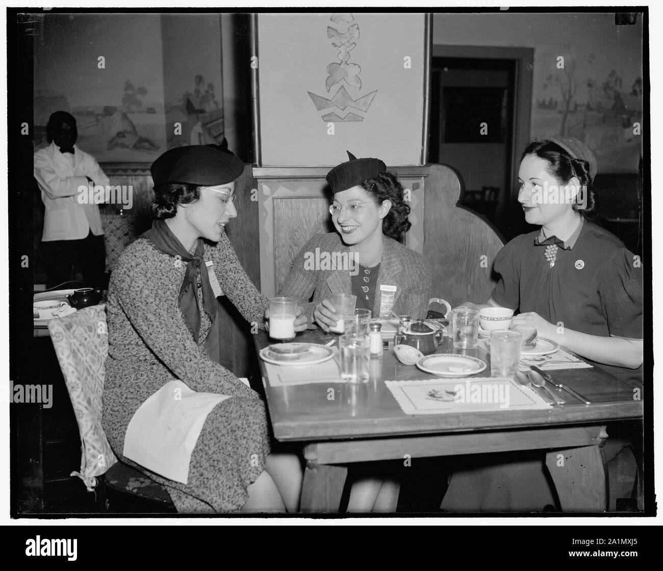 Only women delegates to United Mine Workers Convention. Washington, D.C., Jan. 24. These three women delegates to the Gas, By- Product Coke and Chemical Workers, District 50, United Mine Workers of American Convention being held in Washington, are taking an active part in the daily sessions. Left to right: Pearl Kosby, Bridgeport, Conn.; Esther Perelson, Ozone Park, Long Island, N.Y.; and Esther Levin, also of Ozone Park, 1/24/38 Stock Photo