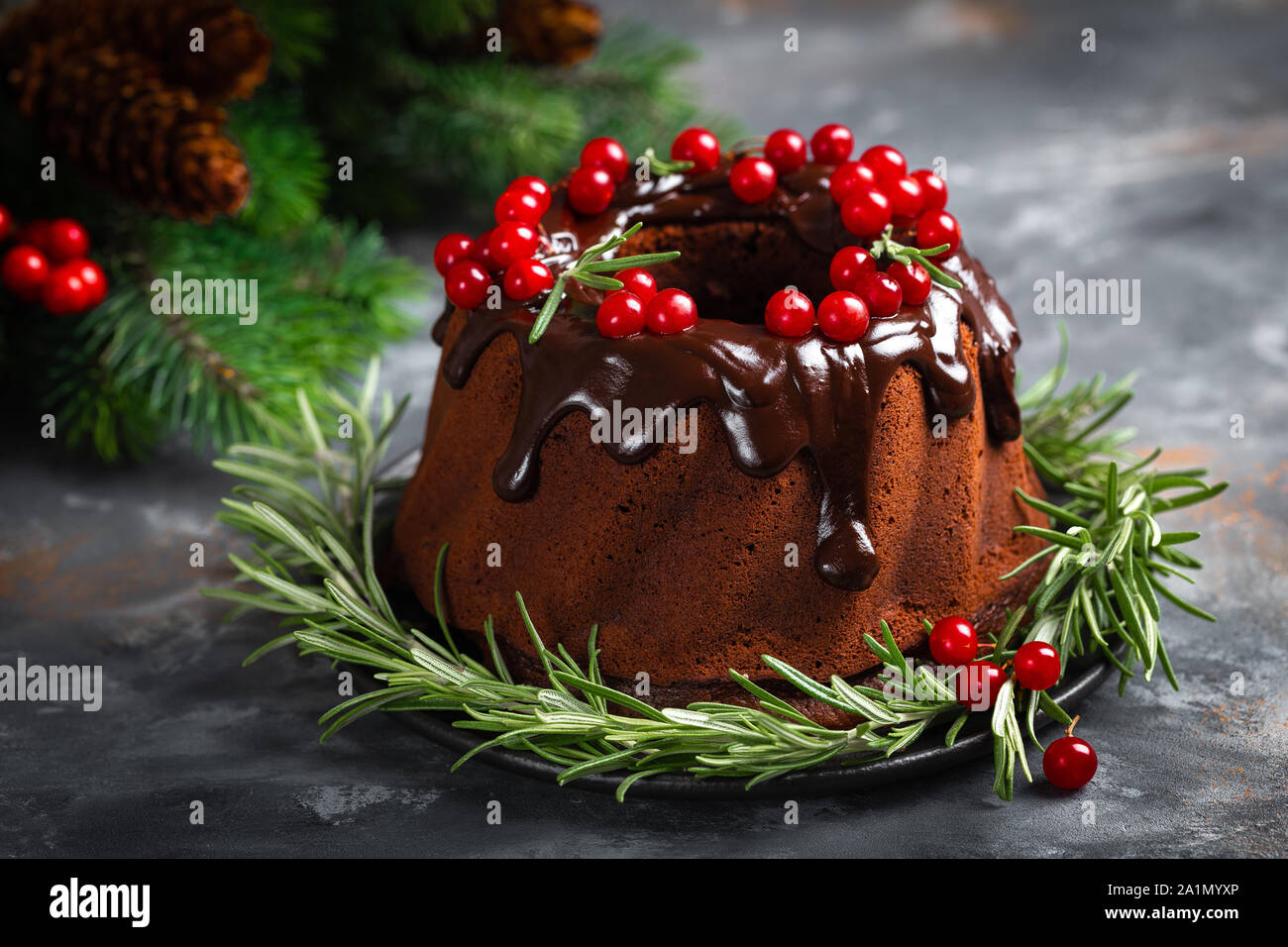 Christmas Chocolate Bundt Cake With Glaze Decorated With Fresh Berries And Rosemary Winter Baking At Xmas Or New Year With Decorations On Dark Backgr Stock Photo Alamy