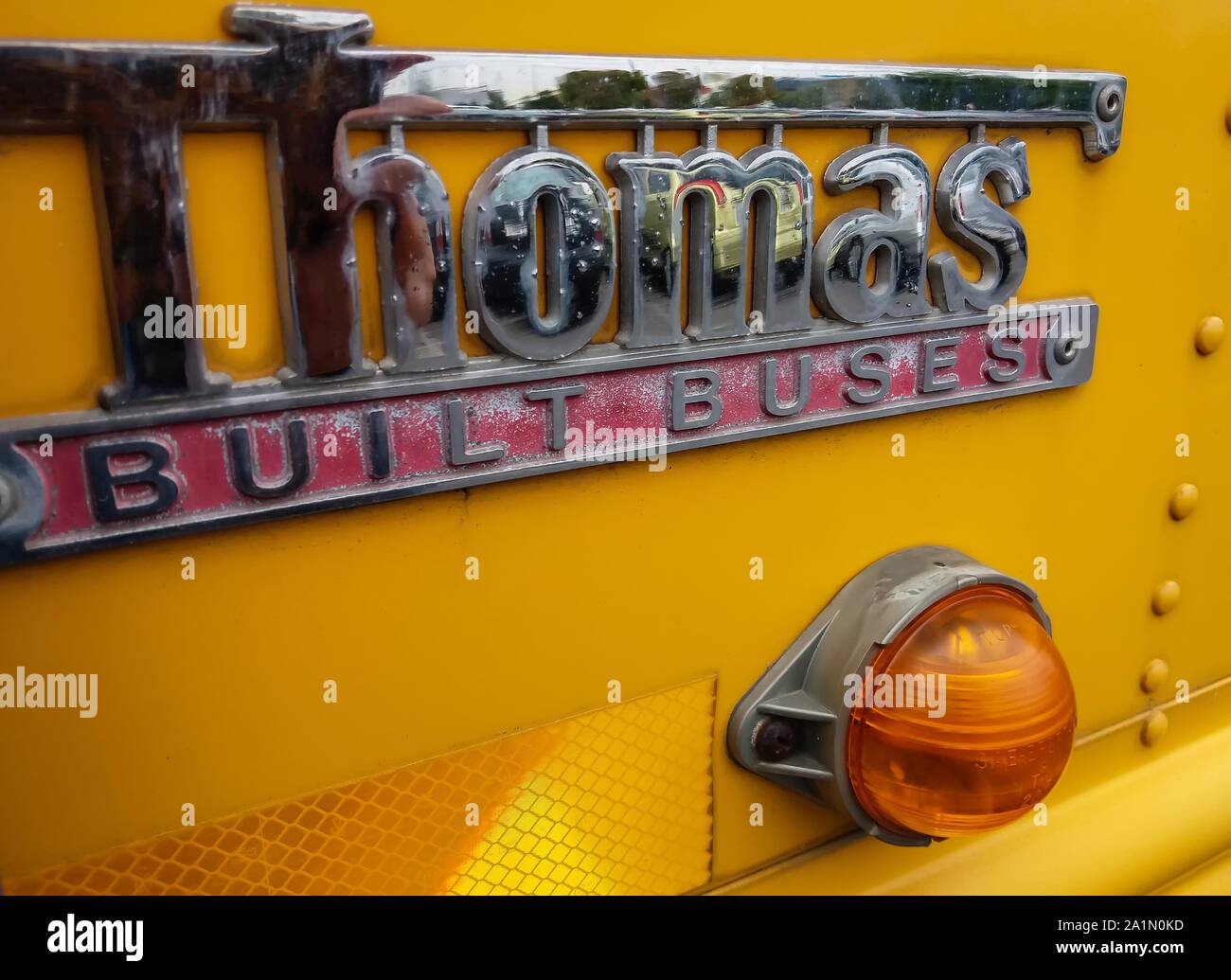 Bucharest, Romania - September 26, 2019: A classic American school bus from Thomas Built Buses on Freightliner FS-65 chassis is parked in Bucharest. Stock Photo