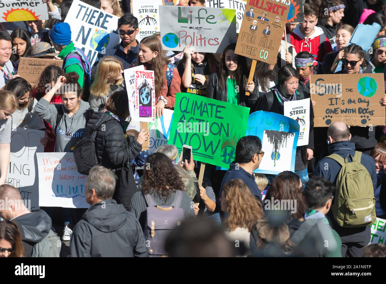 Vancouver, Canada. 27, September 2019. Placards being held by protesters. Climate Strike March. Vancouver, British Columbia, Canada. Gerry Rousseau/Alamy Live News Stock Photo