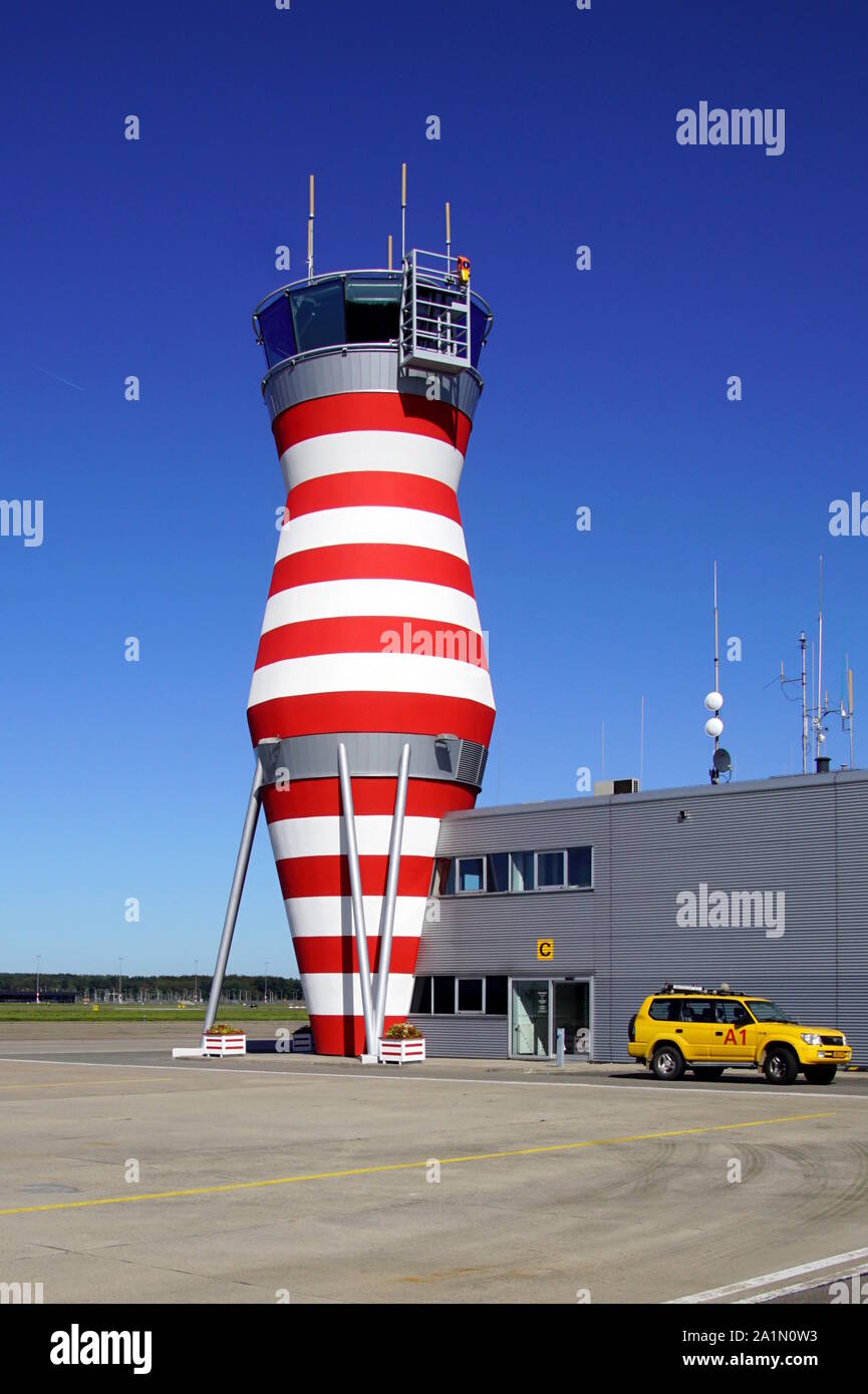 Lelystad, the Netherlands - September 21, 2019: Control tower of Lelystad Airport against a clear blue sky. Stock Photo