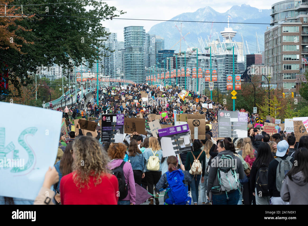 Vancouver, Canada. 27, September 2019. Protesters moving across the Cambie Street Bridge towards the centre of downtown Vancouver.  Climate Strike March. Vancouver, British Columbia, Canada. Gerry Rousseau/Alamy Live News Stock Photo