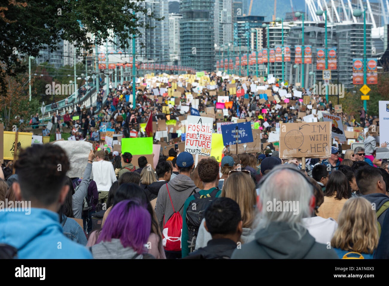 Vancouver, Canada. 27, September 2019. Protesters moving across the Cambie Street Bridge, towards the centre of downtown Vancouver. Climate Strike March. Vancouver, British Columbia, Canada. Gerry Rousseau/Alamy Live News Stock Photo