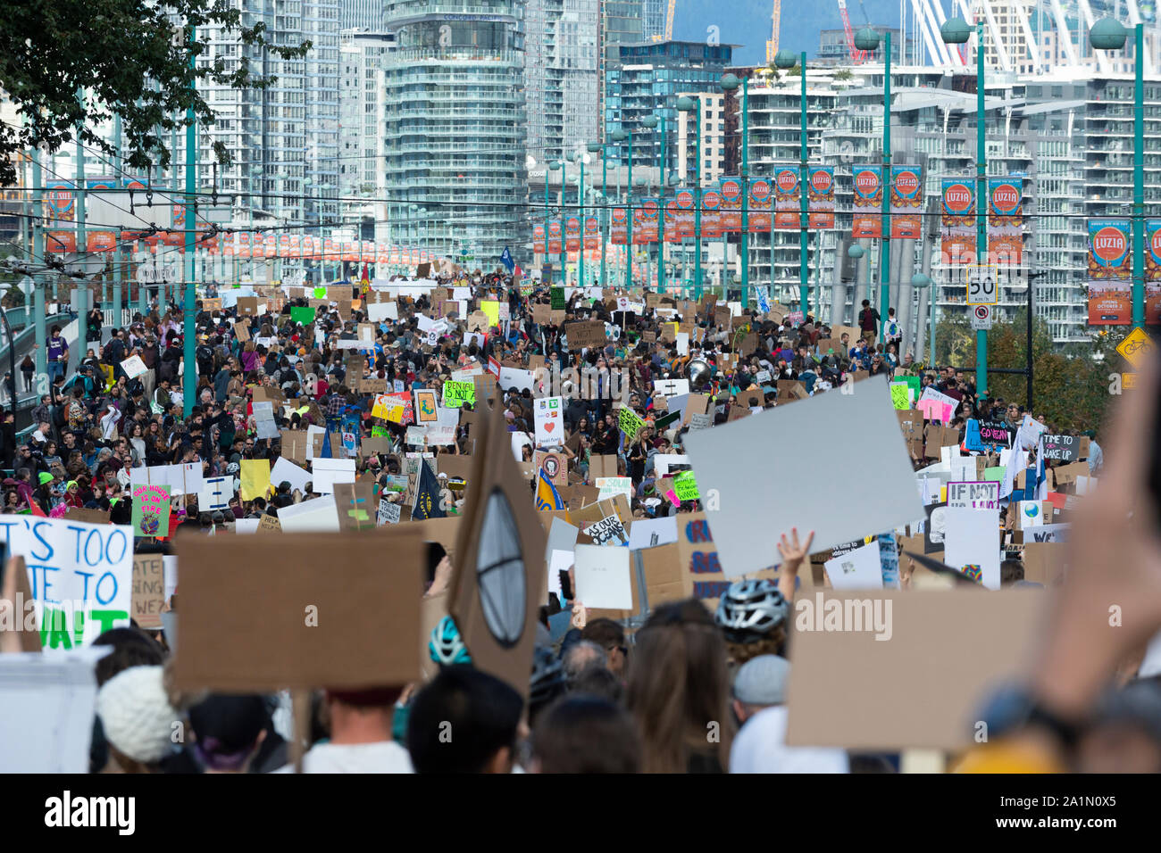 Vancouver, Canada. 27, September 2019. Protesters moving across the Cambie Street Bridge, towards the centre of downtown Vancouver. Climate Strike March. Vancouver, British Columbia, Canada. Gerry Rousseau/Alamy Live News Stock Photo