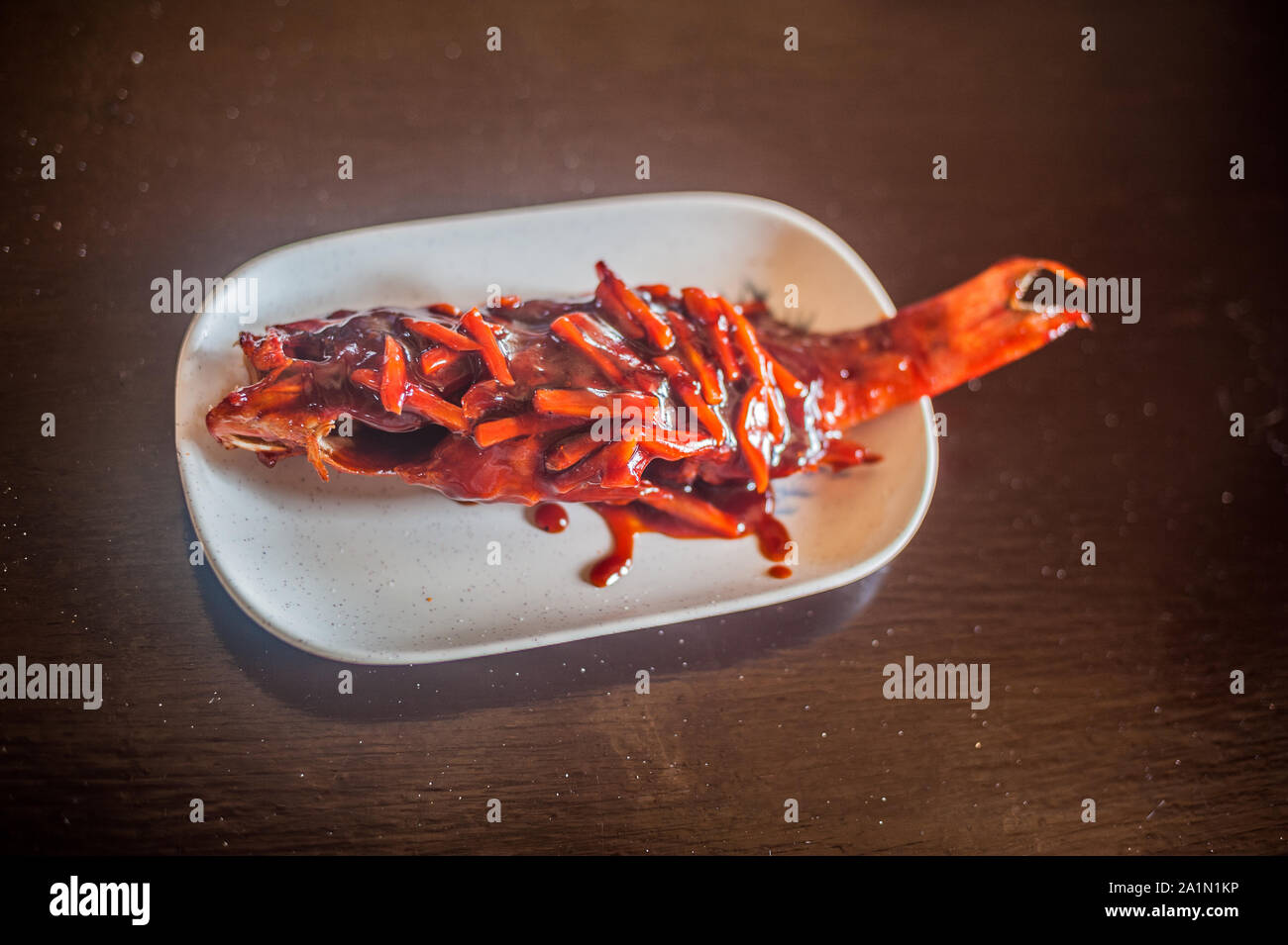 Philippine National dish - fish Stock Photo - Alamy