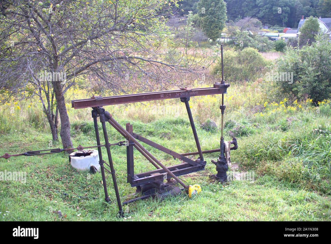 Pumping jack on an oil lease. Bradford Oil Fields, near Bolivar, New York, USA Stock Photo