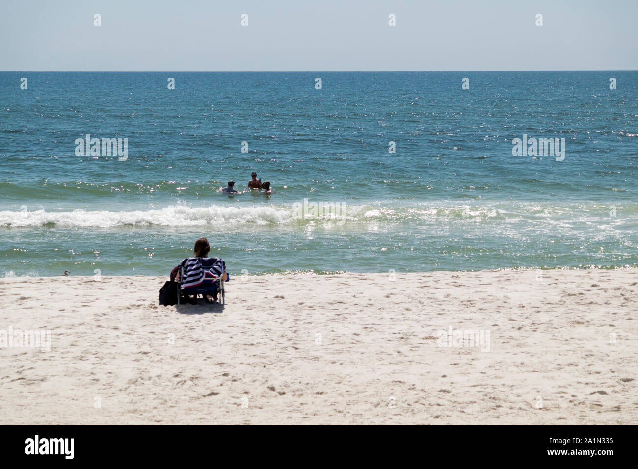 Family vacationing on the Gulf of Mexico beach at Gulf Shores, Alabama, USA Stock Photo