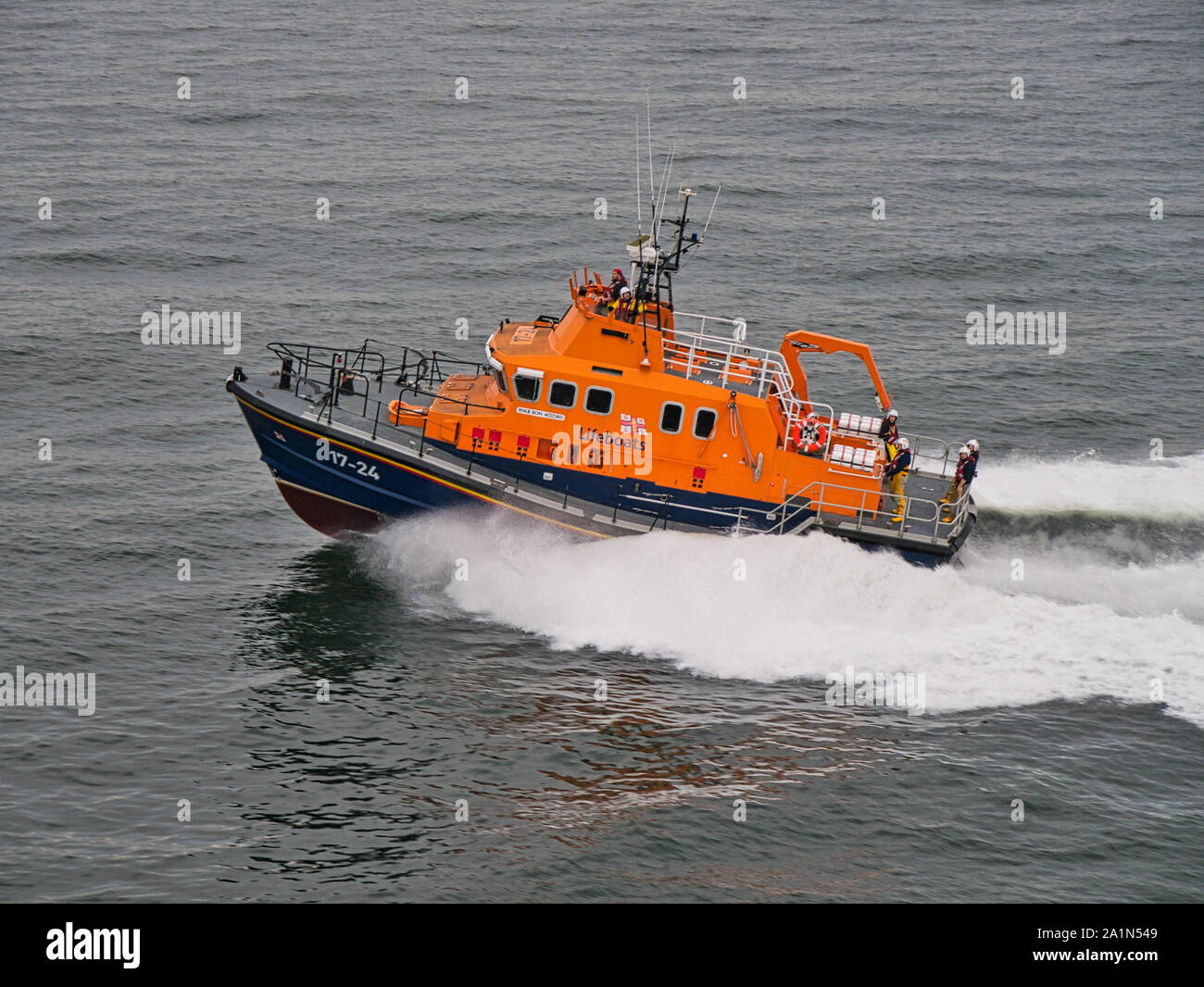 Aberdeen RNLI Lifeboat at sea, travelling at speed - this is a Severn class, self-righting, all-weather lifeboat with a crew of 7. Stock Photo
