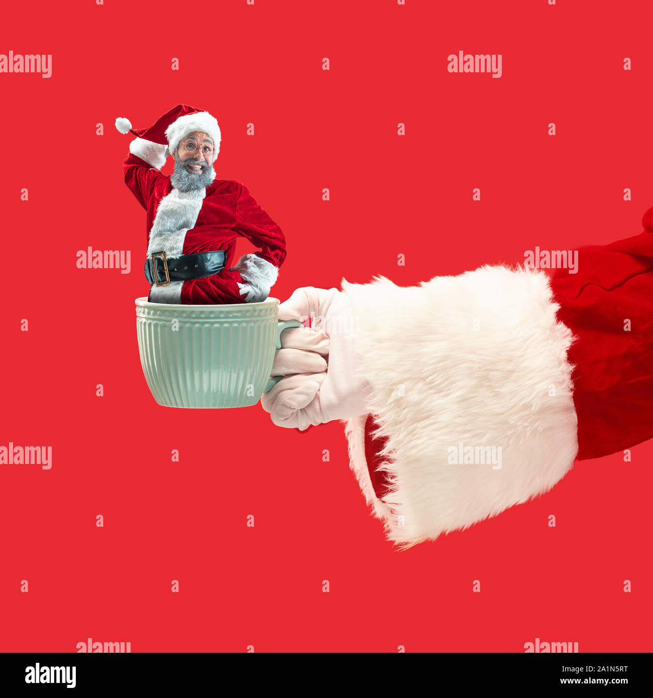 Happy Christmas Santa Claus on red studio background. Caucasian male ...