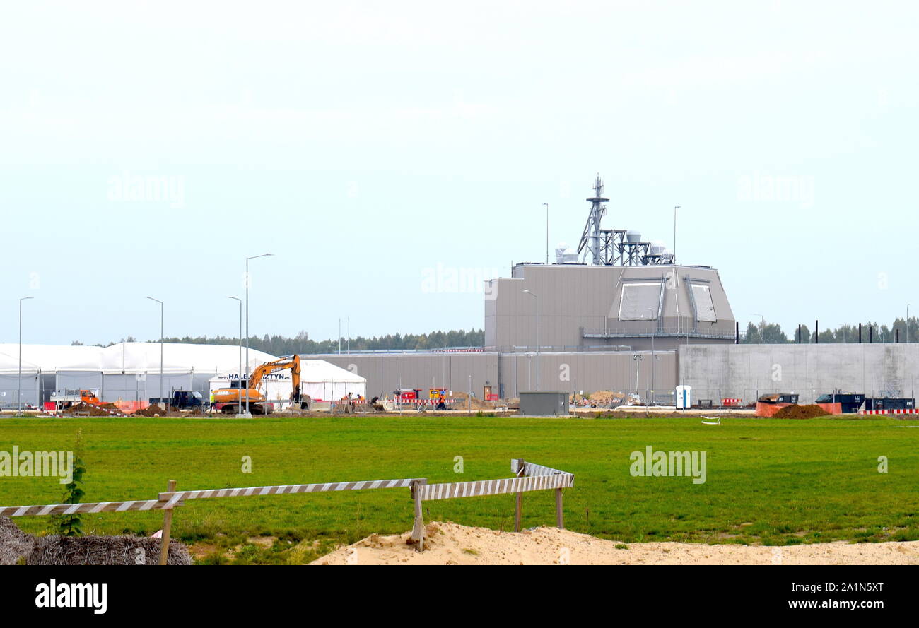 NAVAL SUPPORT FACILITY REDZIKOWO, Poland (Sept. 24, 2019) The   Aegis Ashore Missile Defense System (AAMDS) site in Poland is nearing the final phases of construction at Naval Support Facility (NSF) Redzikowo, the Navy’s newest installation. The first Aegis Ashore site was established at Deveselu, Romania in 2016 as part of the European Phased Adaptive Approach announced by the Obama administration in 2009. Aegis Ashore uses a defensive system almost identical to that used on U.S. Navy Aegis-capable guided-missile destroyers and cruisers at sea. The system is designed to detect, track, engage Stock Photo