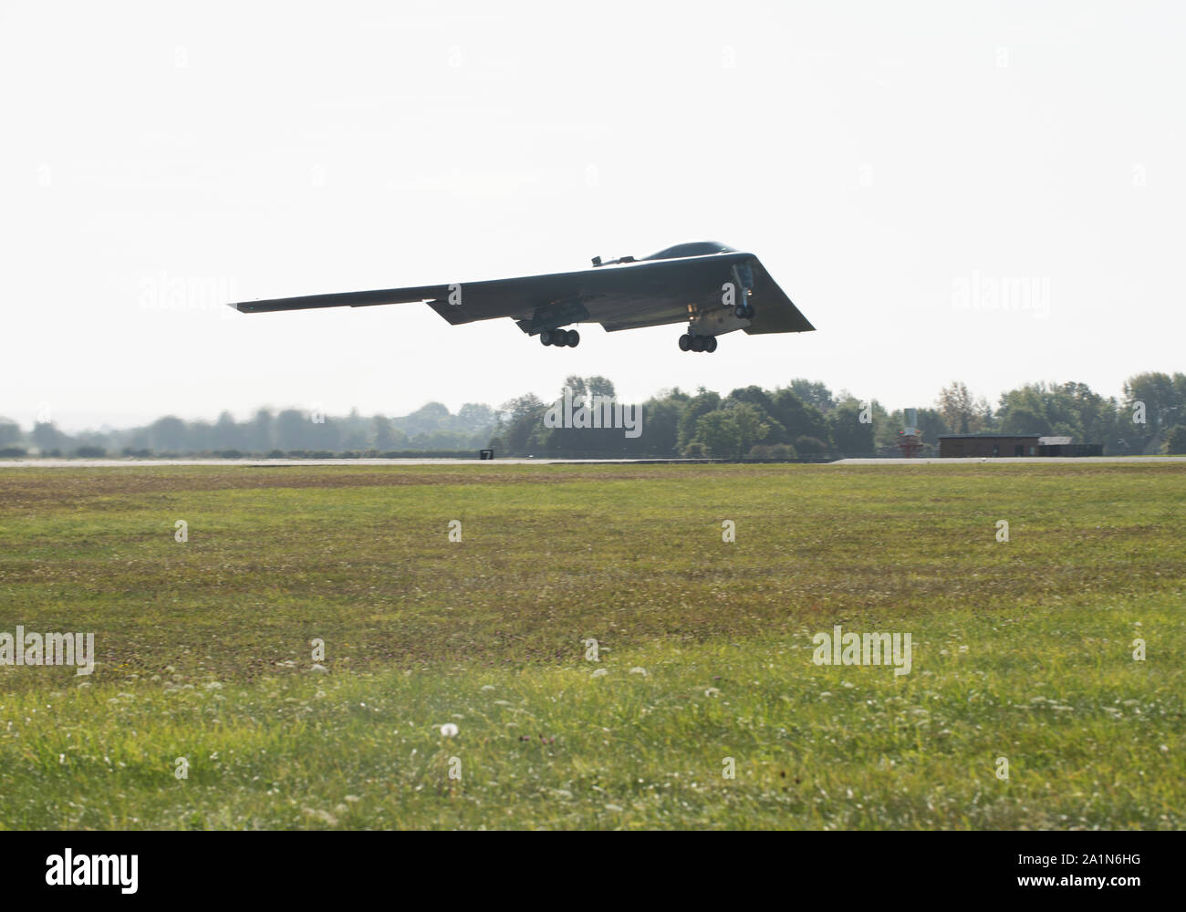 A B-2 Spirit takes off on Sept. 19, 2019, at Royal Air Force Fairford, England. Three B-2's deployed to RAF Fairford as part of Bomber Task Force Europe, which challenged the stealth aircraft, as well as Airmen and support equipment from Whiteman Air Force Base, Missouri, to confuct integration and flying operations at forward locations across Europe. (U.S. Air Force photo by Staff Sgt. Kayla White) Stock Photo