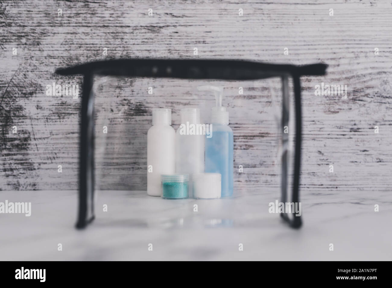 airport screening rules concept, small lotions for liquids and gel next