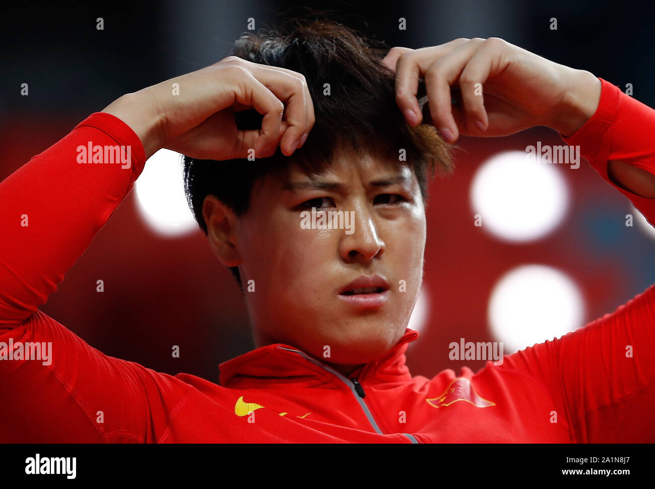 Doha, Qatar. 27th Sep, 2019. Luo Na of China reacts during the qualification round of women's