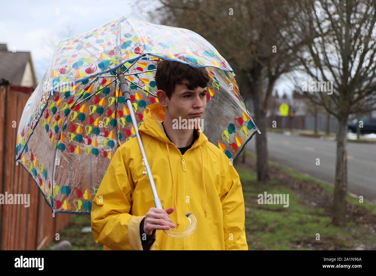 Teenage boy out for a walk during cold fall weather Stock Photo - Alamy