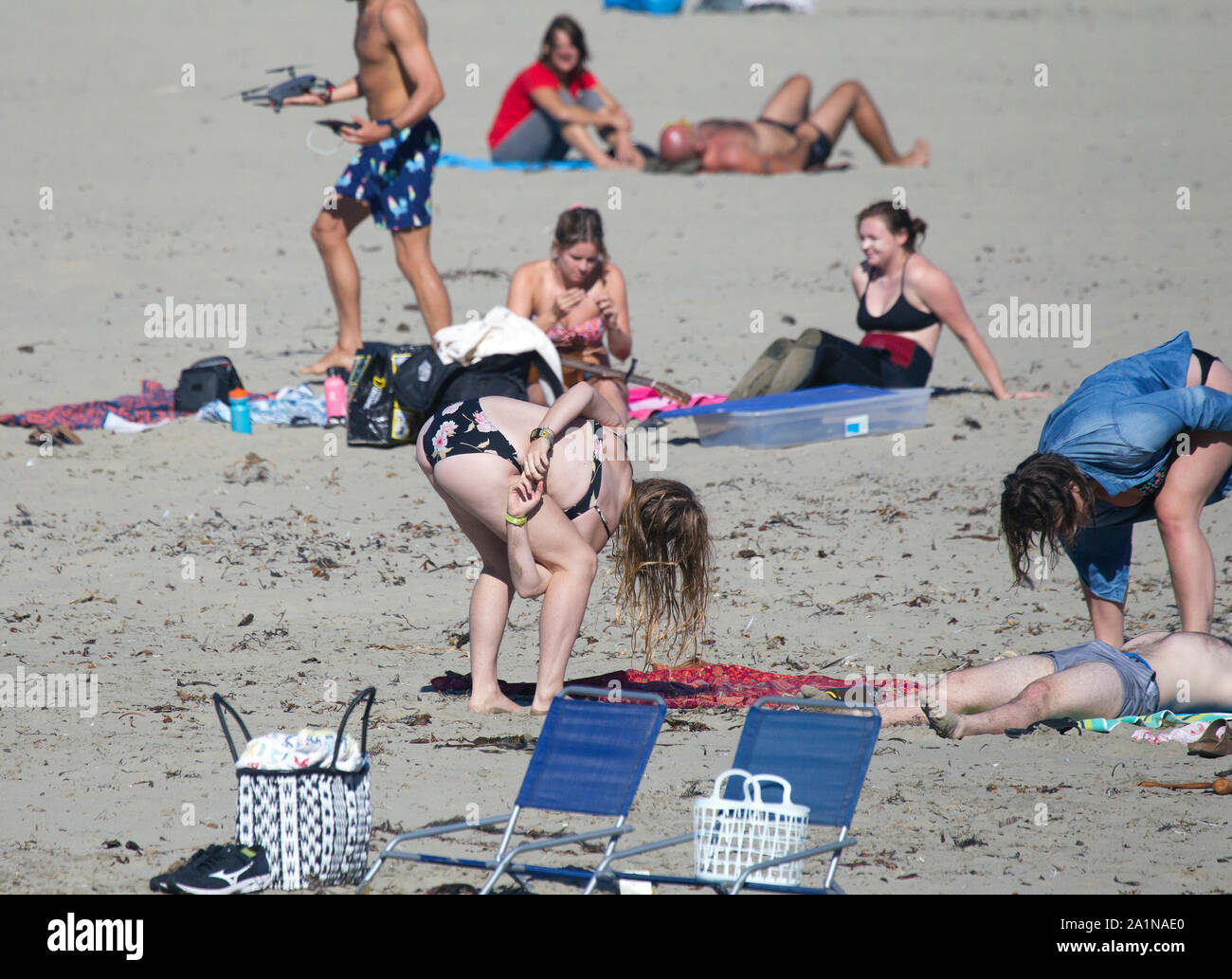 Girl in Bikini Practicing Twister game Stock Photo - Alamy