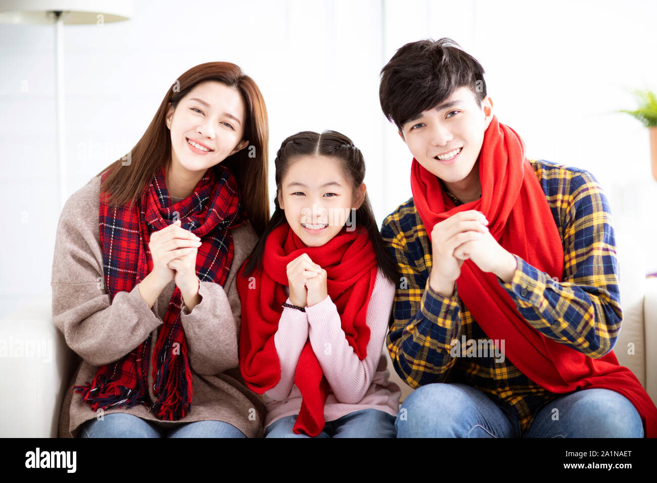 happy asian family with congratulation gesture for chinese new year Stock Photo