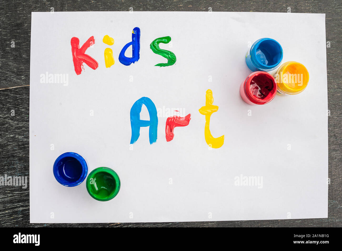 inscription Kids art on white paper, colored inks. Kids art concept ...