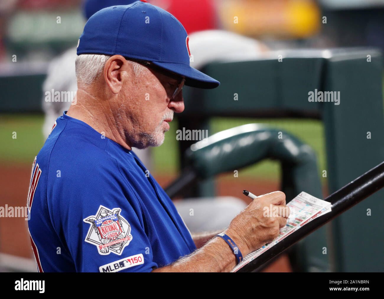 St. Louis, United States. 27th Sep, 2019. Chicago Cubs manager Joe Maddon  checks his lineup card during a game against the St. Louis Cardinals at  Busch Stadium in St. Louis on Friday