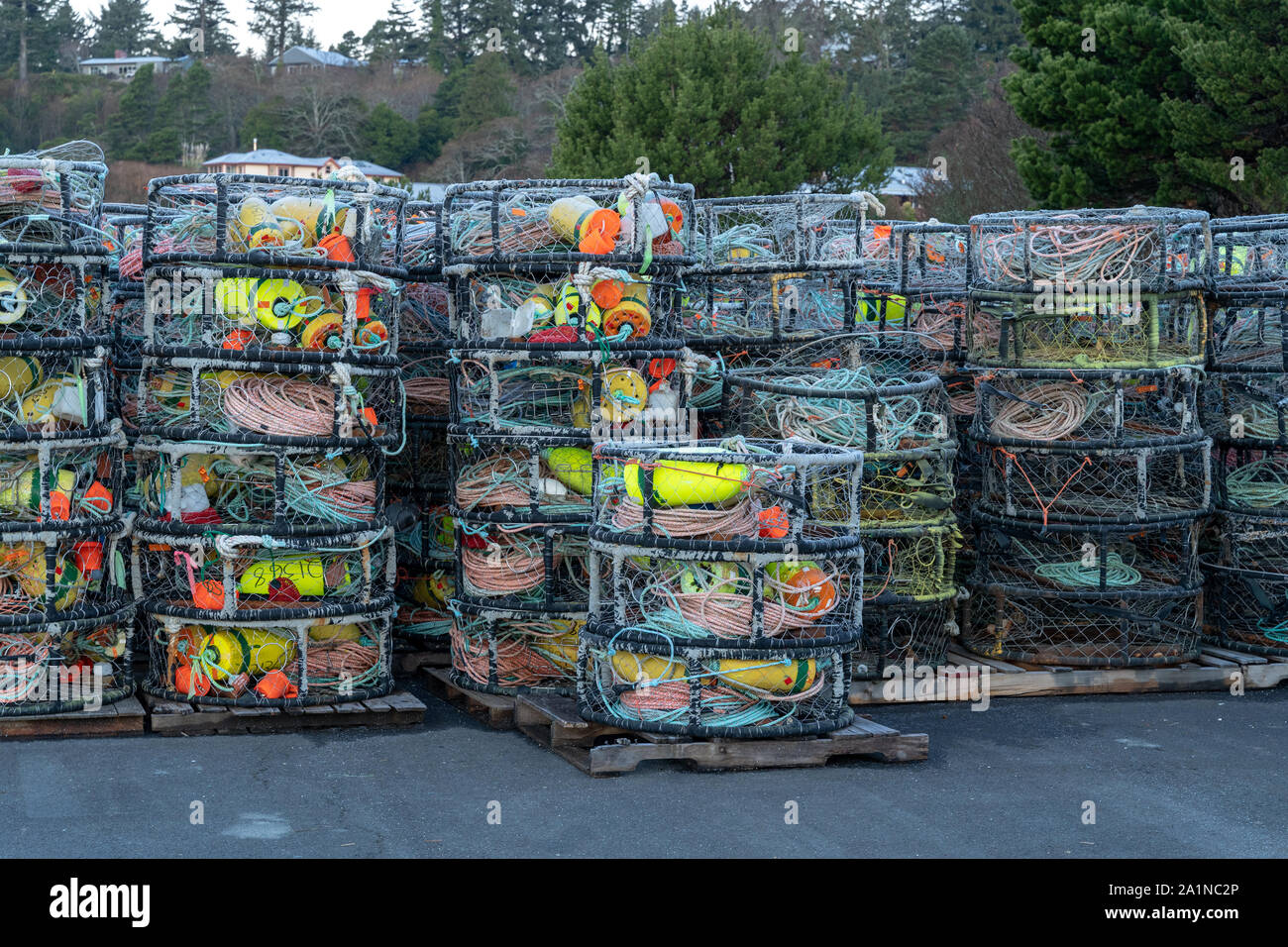 Crab traps, pots and floats, stacked on wharf,Yaquina Bay, Newport Oregon Stock Photo
