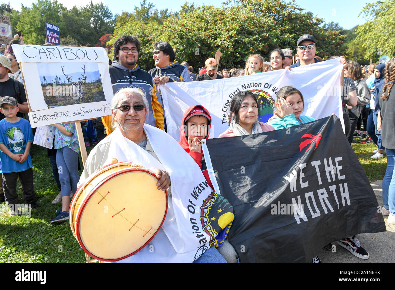 Canadian indigenous people joined the half a million people who went to the Global Climate Strike on September 27, 2019 in Montreal, Canada. They demanded more concrete actions from authorities to counter global warming and climate change. Stock Photo