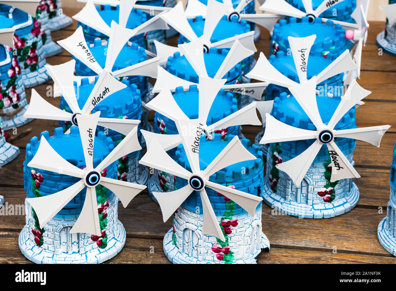 Souvenir windmills outside a shop in Alacati, Izmir, Turkey Stock Photo