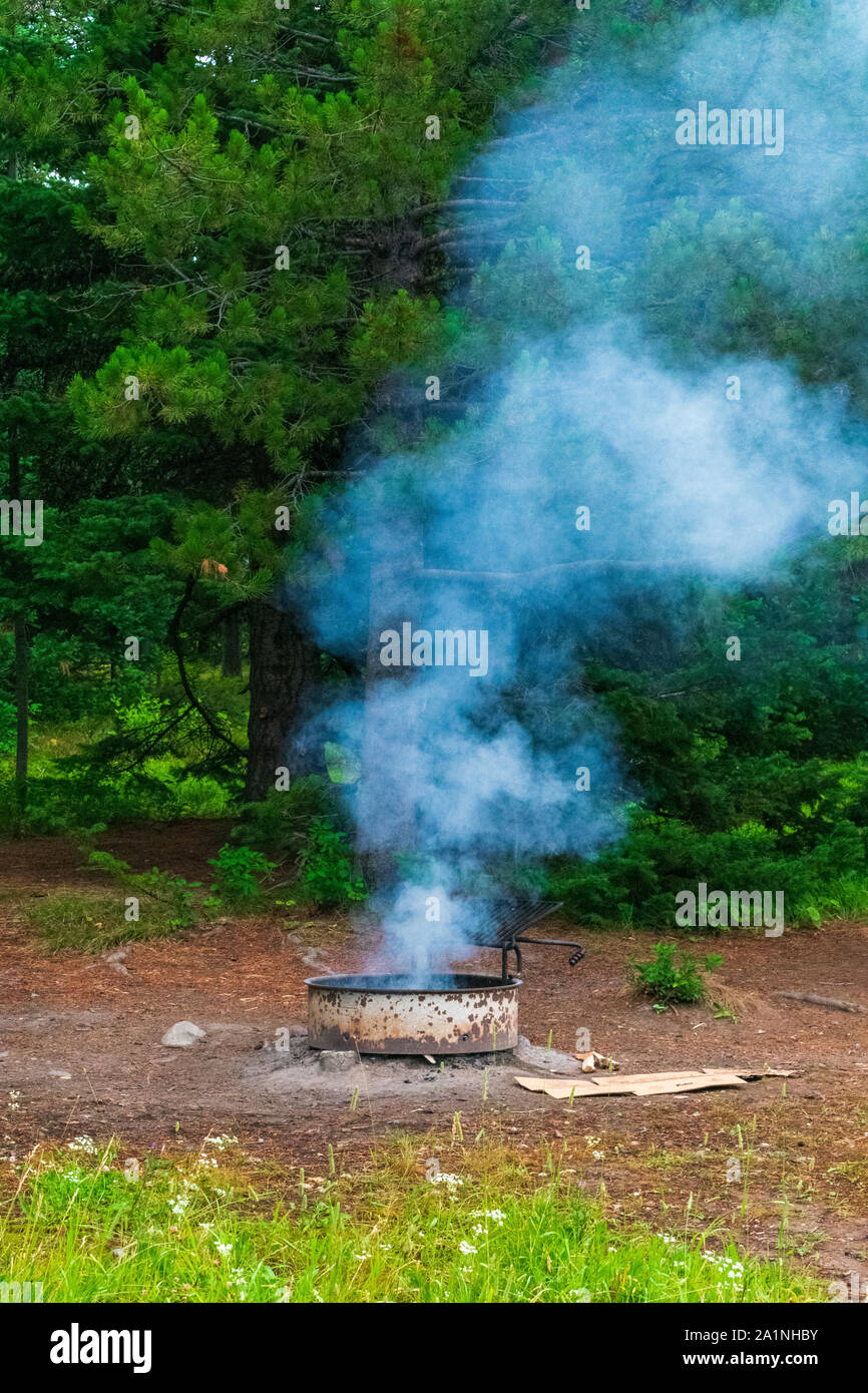 Campfire Smoking In Camp Site Stock Photo Alamy