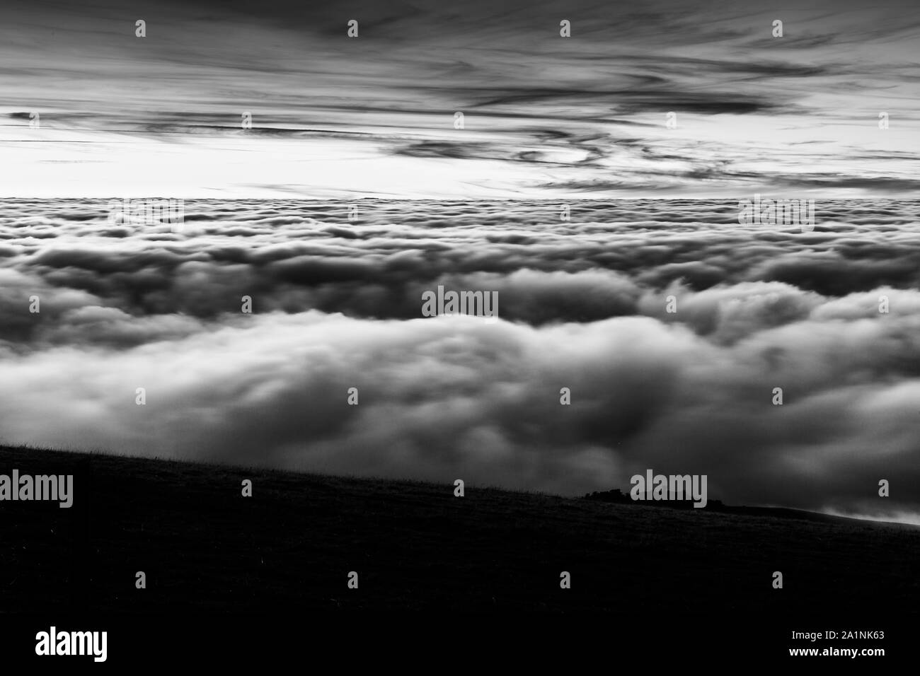 Sea fog filling valley hi-res stock photography and images - Alamy