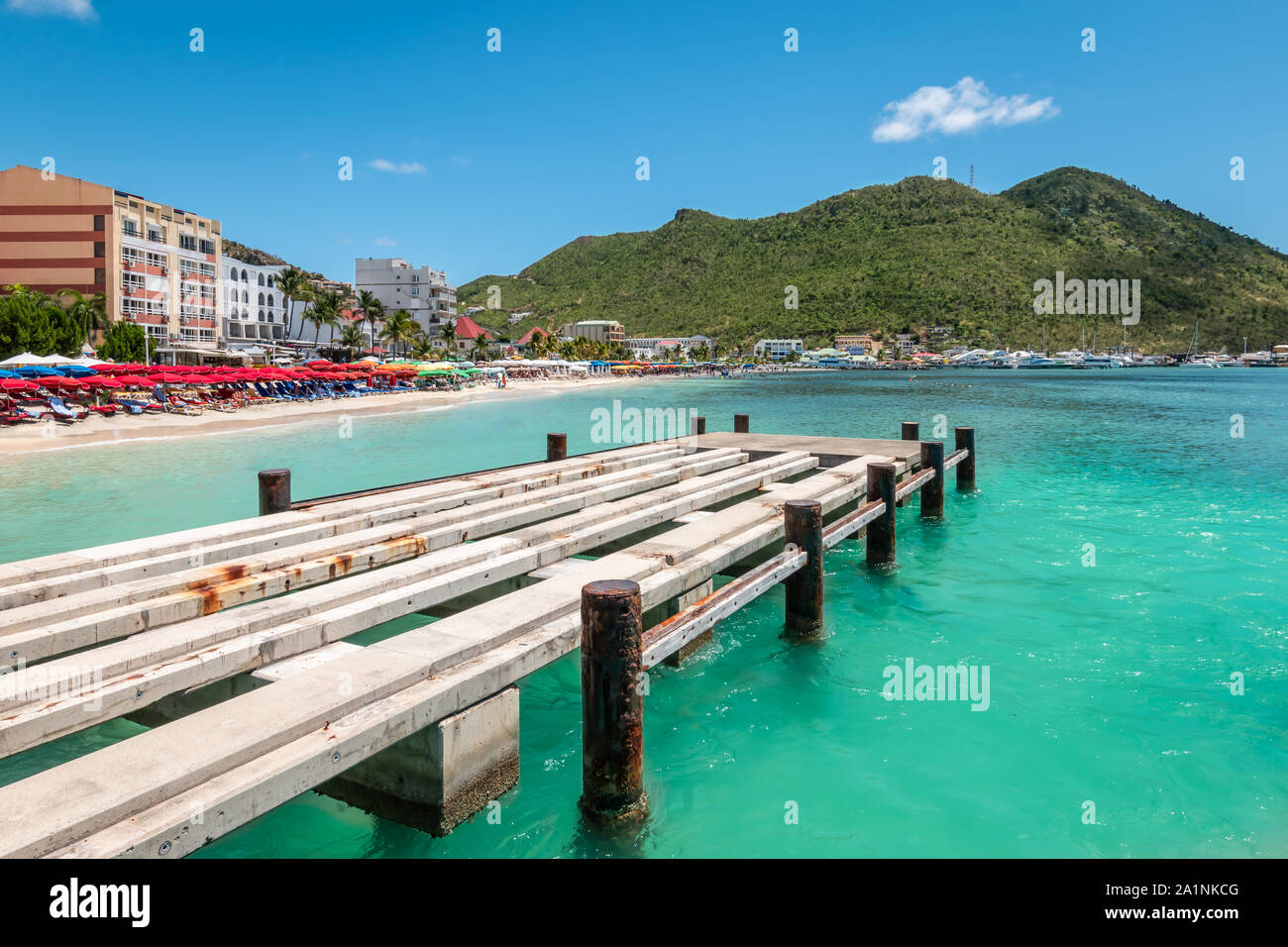 Wooden pier at Great Bay beach in Philipsburg, Sint Maarten, Caribbean. Stock Photo