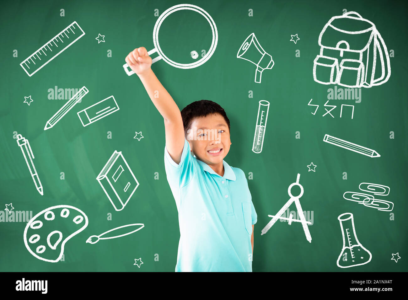 happy asian boy standing against chalkboard and education concept Stock ...