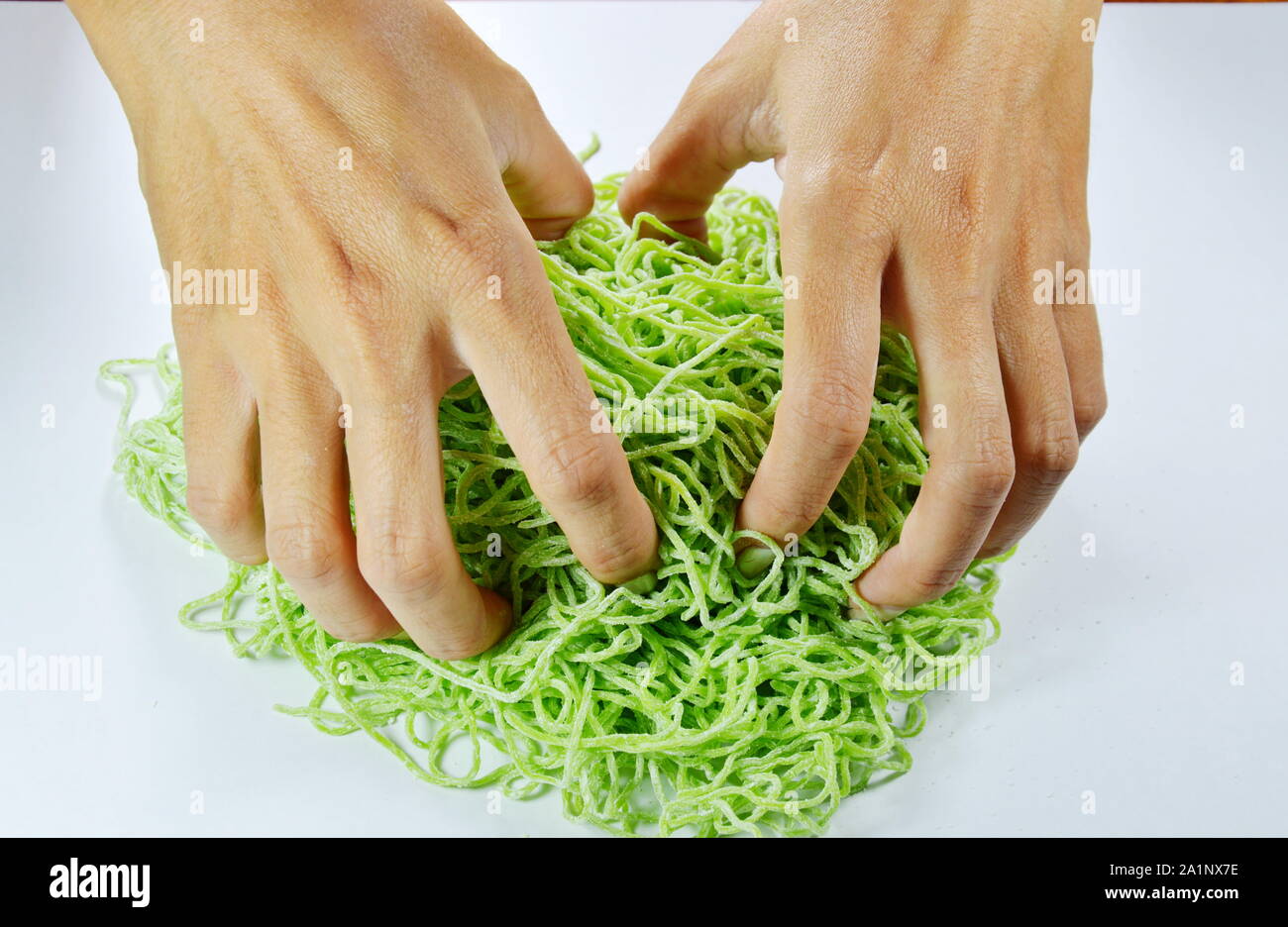 hand thresh raw Chinese jade noodle prepare to cook Stock Photo Alamy