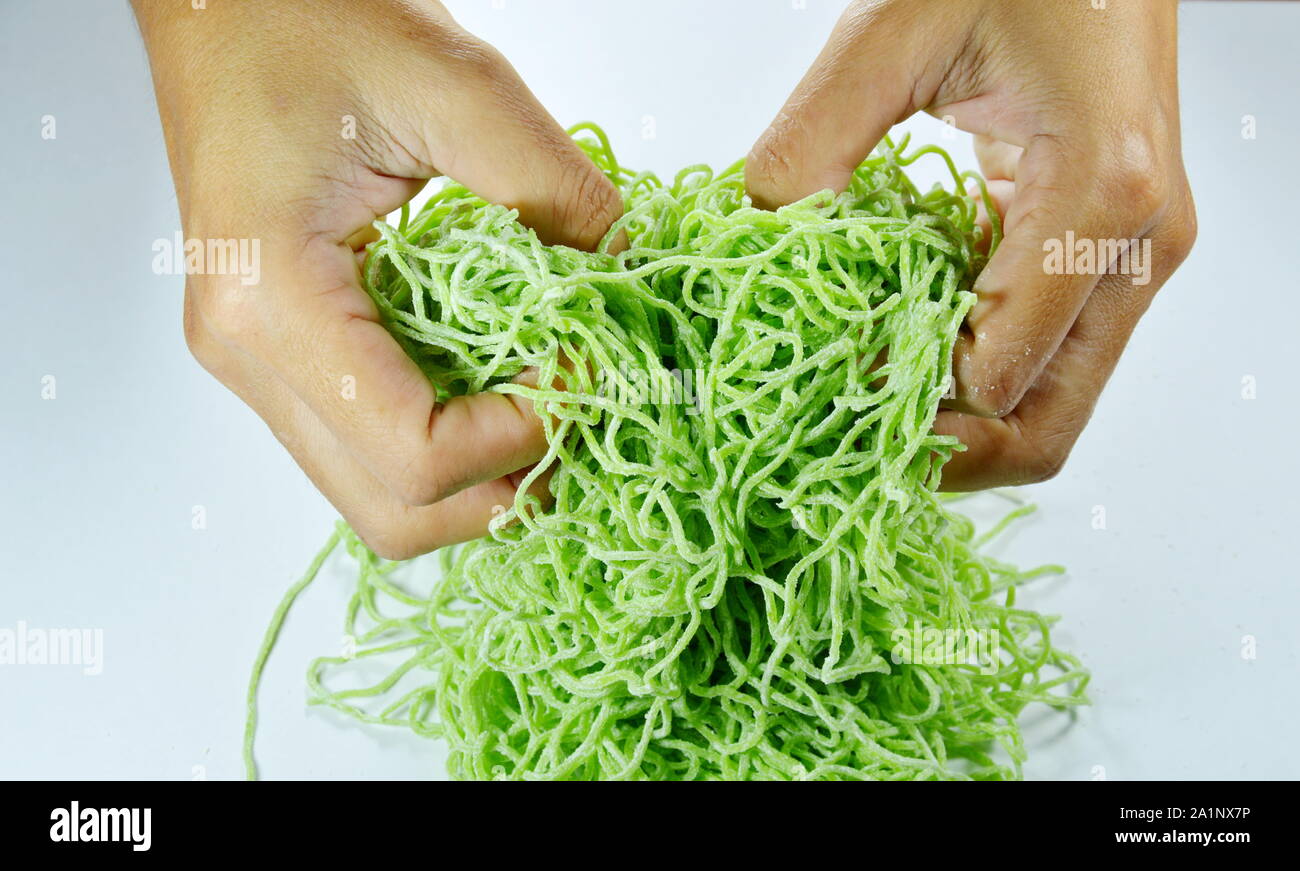 hand spread raw Chinese jade noodle prepare to cook Stock Photo Alamy
