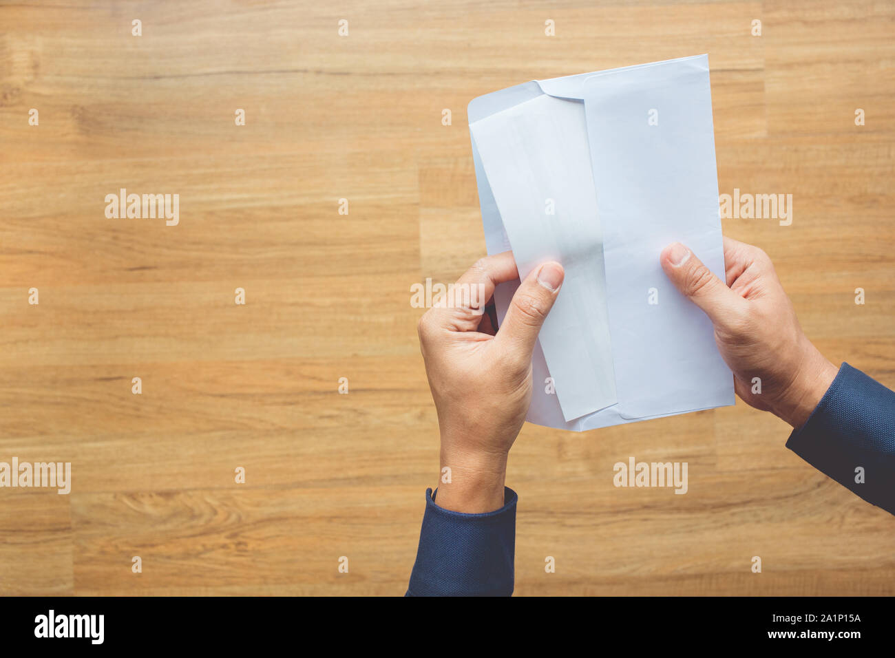 Male Holding Paper Envelope Letter On Floor Wood Business