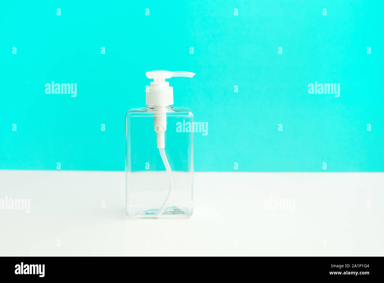 Bottle lotion transparent on blue background. healthy and body concepts ideas Stock Photo