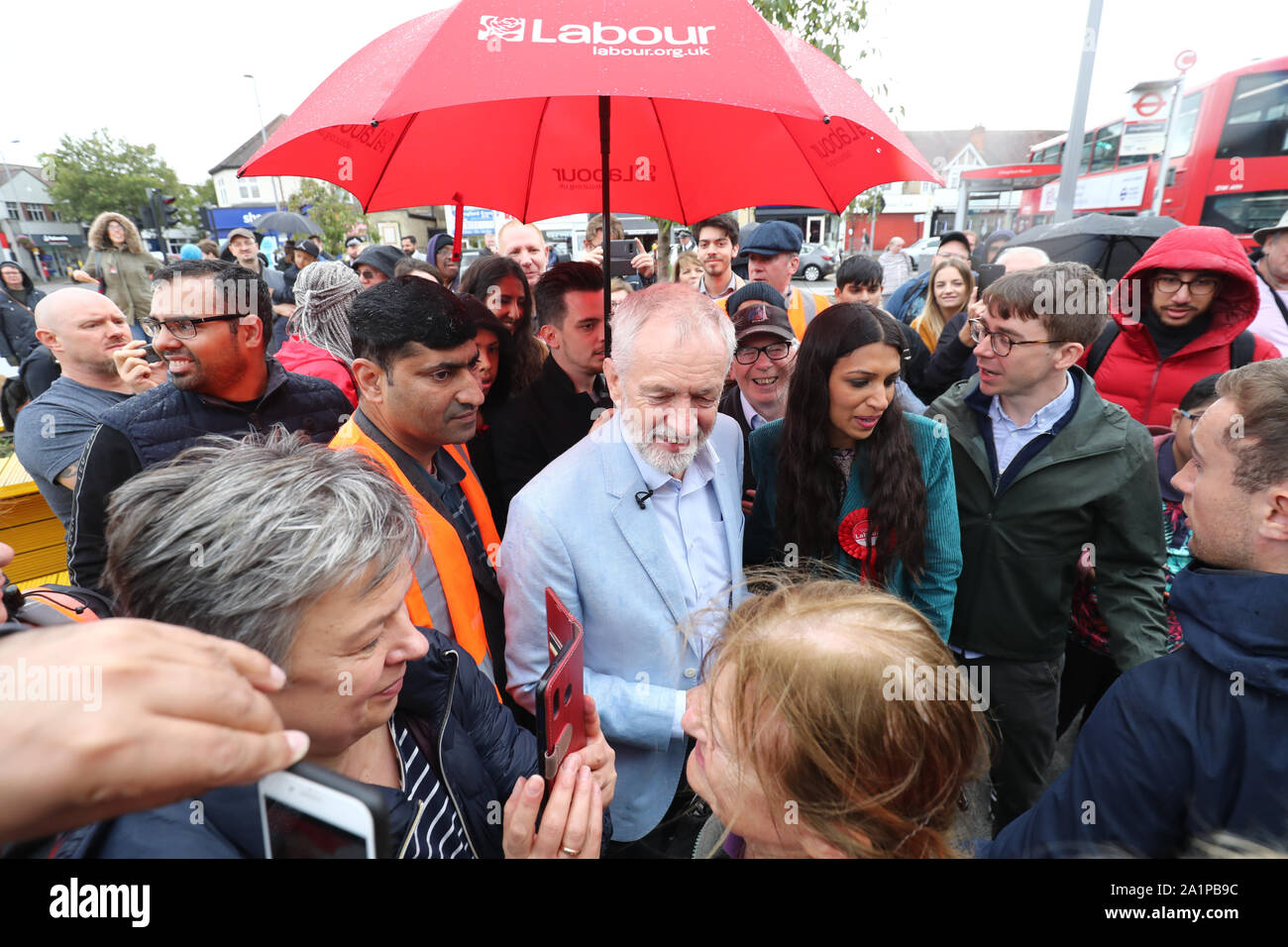 Labour leader Jeremy Corbyn, with Labour Party parliamentary candidate for Chingford and Woodford Green Faiza Shaheen, during a visit to Chingford, where he announced that Labour plans to scrap Universal Credit and replace the Tories' flagship welfare reforms with a social security system to support jobseekers 'with dignity and respect'. Stock Photo