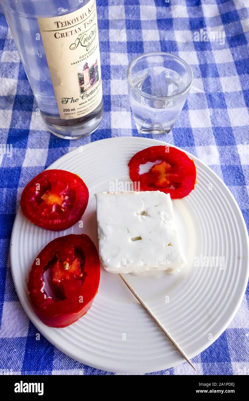 Meze of Feta Cheese, Tomato and Tsikoudia Raki, Crete, Greece Stock Photo