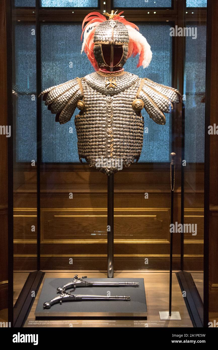 Dresden, Germany. 28th Sep, 2019. A scale armour with Maltese crosses (around 1700) hangs in a showcase in the Royal Parade Rooms in the Residence Palace. The 18th century apartments in the castle, destroyed in the Second World War, have been reconstructed and opened on the same day. Credit: Sebastian Kahnert/dpa-Zentralbild/dpa/Alamy Live News Stock Photo