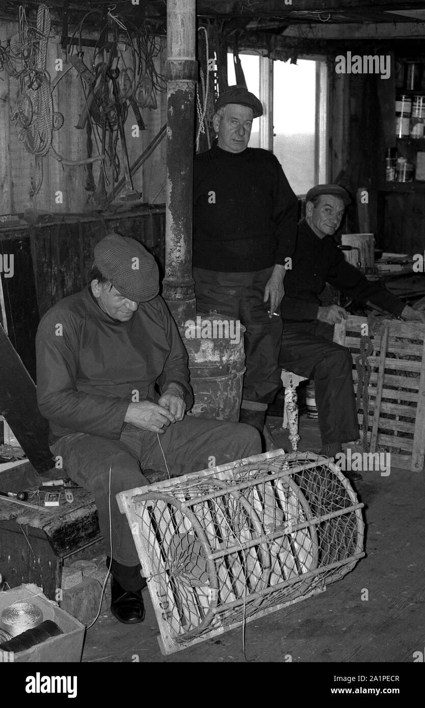 Fishermen making/repairing crab/lobster pots at Beadnell