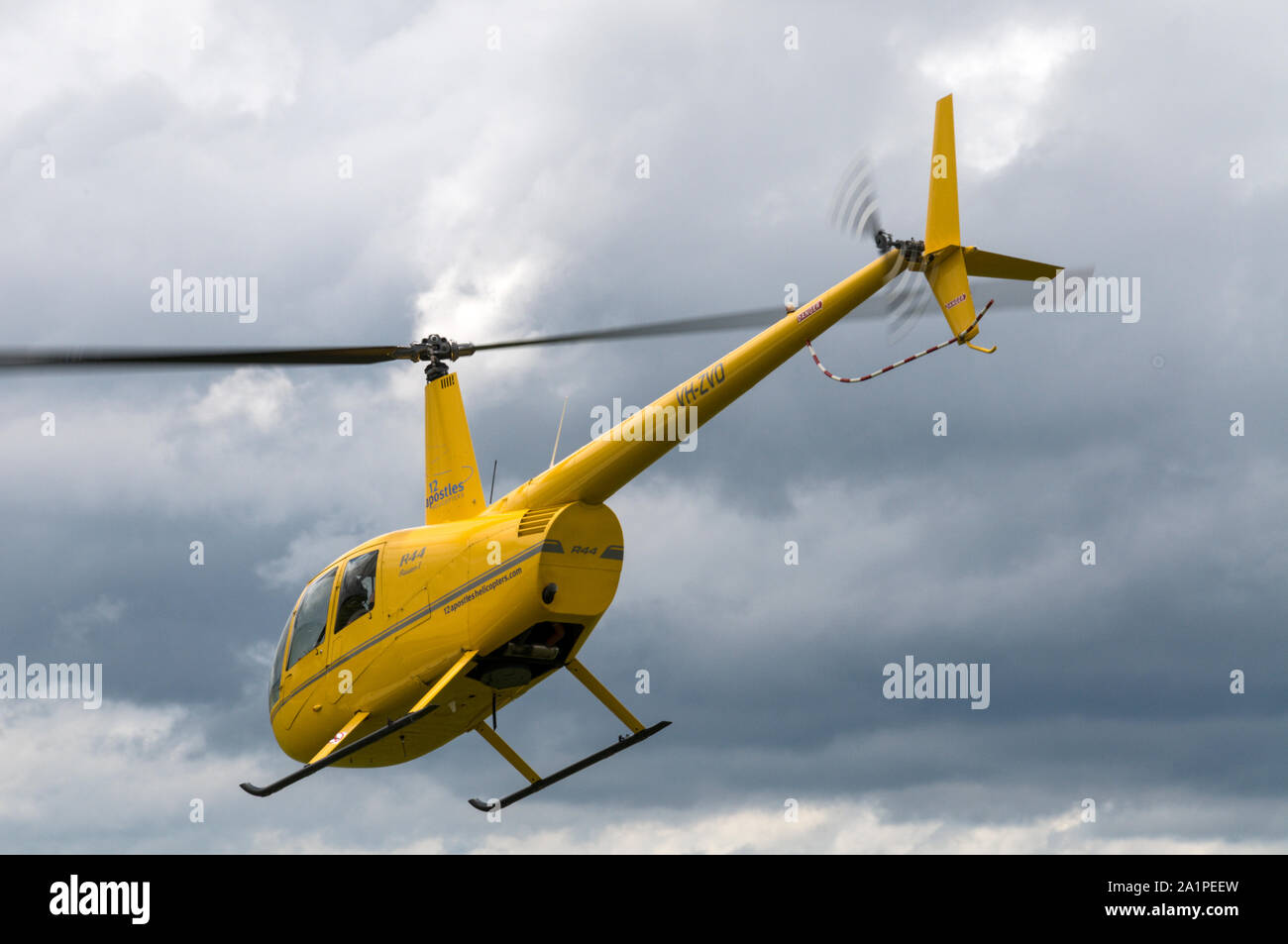 A tourist sightseeing Raven R44 helicopter lifts off at the Twelve ...